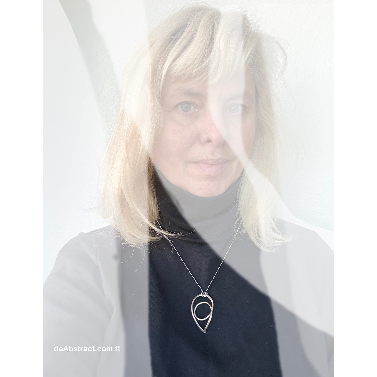 'de Loop' Earrings, Sterling Silver, handmade, forged, and hammered.